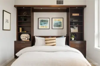 This Murphy bed, when up, has a drop-down desk, converting this west-facing view bedroom into an office