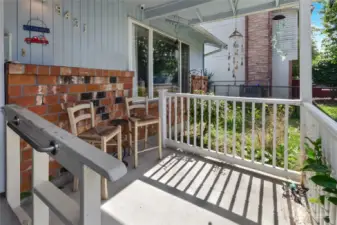 Front covered porch is inviting and has western exposure!