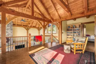 Upstairs loft features an open railing overlooking the Great Room below.