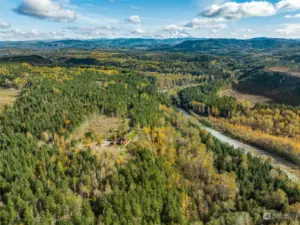 Acreage across the gravel community road is cleared and ready for you to build a barn, ADU, or... Whatever your imagination desires!