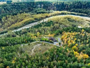 Acreage across the gravel community road is cleared and ready for you to build a barn, ADU, or... Whatever your imagination desires!