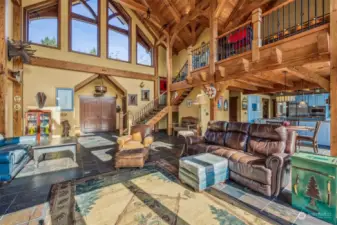 The great room really IS great- open beams, vaulted ceilings, and windows complimenting the rustic architecture this home so perfectly offers.