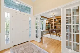 Entry foyer with office on the left and formal living room on the right.