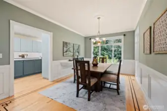 Formal dining room, adjoins the kitchen, with hardwood floors and can easily accommodate a larger table.
