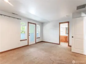 Spacious Primary Bedroom leading out to covered balcony