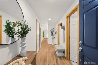 Entry into the unit. The private laundry room is located through the right door.