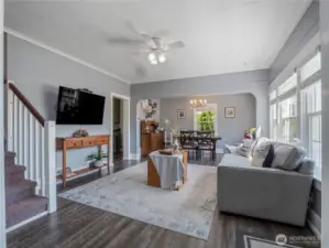 Open concept living, dining, and den make this an ideal space.