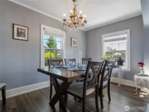 Another view of the dining room. This space can easily accommodate a take and chair to seat 8 people.
