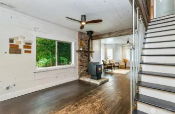 More natural light coming into the dining area.  Yes, the floors are worn, it adds to the vintage style of the house!