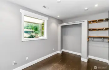 2nd bedroom on main floor, again the natural hardwood floors are part of the charm.