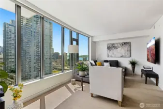 All window treatments are included. You will enjoy privacy on the 21st floor while still enjoying city activity and the breathtaking views of the Pudget Sound, mountains and city lights.