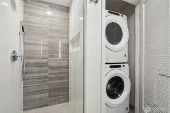 In unit laundry is tucked tastefully in its own closet.