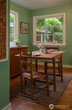 A perfectly lovely breakfast nook off the kitchen with two large pantries on each wall. The perfect place to welcome the day.
