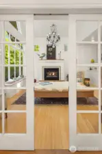 Gorgeous pocket doors usher you from library to living.