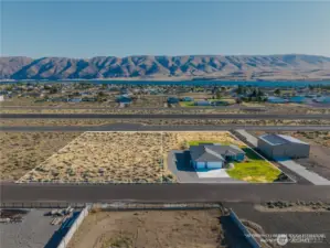Land in back of the house goes almost to the runway - plus the 1/2 acre lot to the left = All yours!