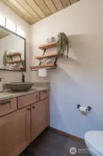 The is a powder bath off the entry for guests.