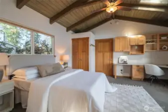 The first primary suite is luxe with beautiful natural light and has an office space.