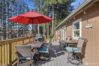 Large deck off back of house overlooking the yard and stables.