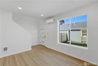 Light-filled living space with large windows and open layout