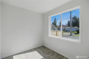 Main-level bedroom or flexible office space