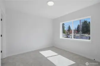 Primary suite with great natural light and comfortable layout