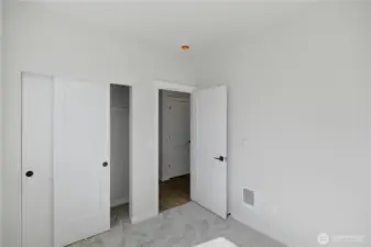 Additional upstairs bedroom with functional layout