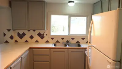 You can admire your apple tree from your kitchen window.