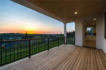 Expansive covered deck to enjoy beautiful sunsets from all year long. Optimal privacy backing to the open space