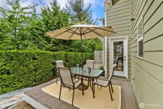 Oversized Deck has plenty of room for bbq and table plenty of space for flowers or vegetable container gardening also.