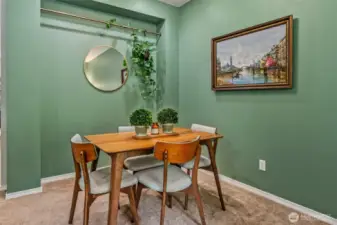 Dining Area with elevated ceilings and buffet niche.
