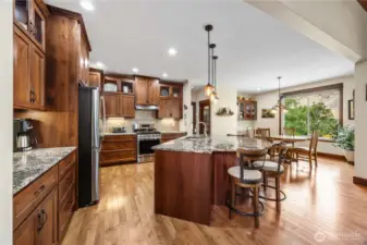 Kitchen with Cherry Cabinets, Granite Countertops, Bar Seating, it is an enterainers dream.