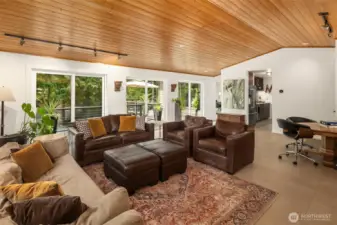 Relax or entertain in style in the stunning family room with 3 sets of sliding doors that open onto the expansive deck.
