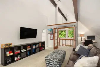 French doors open to the upper level bonus room with flexible options.