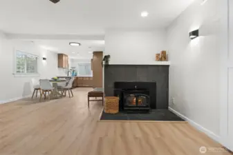 Enjoy a nice wood burning fireplace in this open floor plan