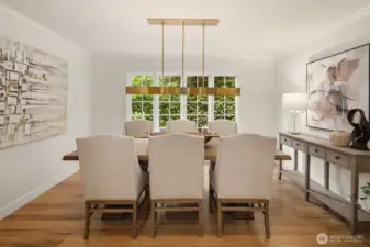 Elegant dining room with garden views and designer lighting