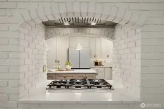 Charming brick arch detail frames the cooktop with character and style
