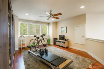 Upstairs loft with attic storage through the little man door.
