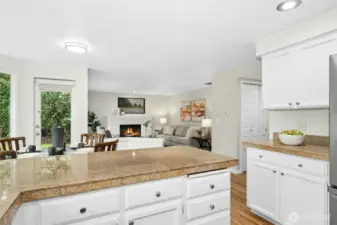 Angle looking towards the breakfast nook and family room. More cabinets and counter space to the right.