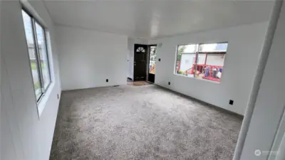 Living room with new carpet and paint