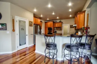 Enjoy visiting with guests at the bar counter as you're preparing a meal. Walk in pantry