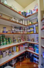 Walk in Pantry with spacious shelving for storing all your kitchen gadgets!