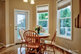 Casual eating nook with door to the expansive deck.