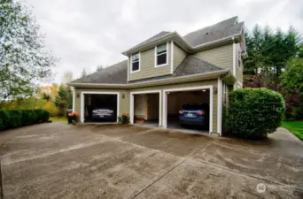 Insulated 3 car garage. Concrete driveway 4 inch min. Hot and Cold Faucets in garage, leaf gutter guards