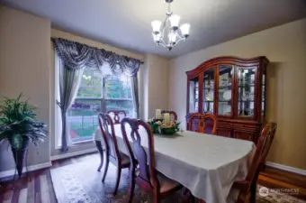 Formal dining room. The table and china hutch is for sale.