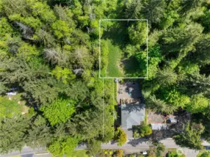 Property is accessed via a 12' wide easement to the left of the neighboring house.