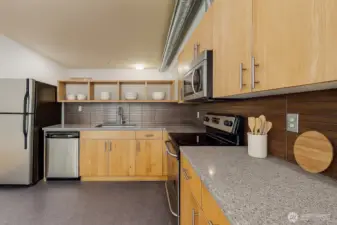 Kitchen looking towards bedroom loft