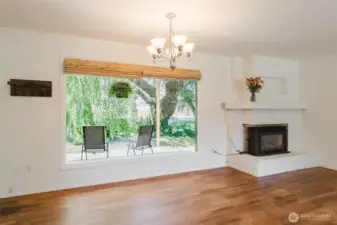 Oversized windows to watch your weeping willow tree.