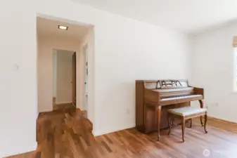 Hallway to two bedrooms and full bath.