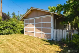 Remove temporary wall inside the shop to take advantage of the two car garage.