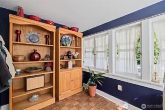 Abundant windows drench the room with natural light.